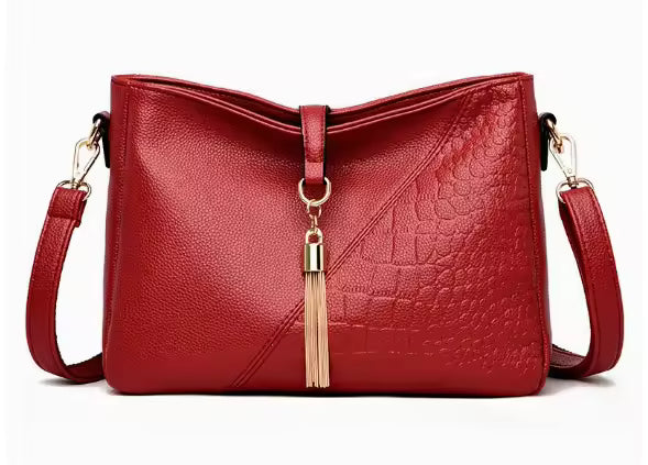 The Jacē Scarlet Tassel Hobo